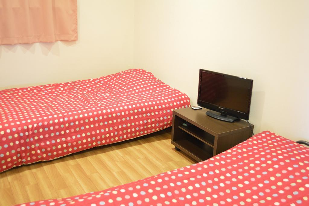 Guest House Fukutomi - Female Only Naha Zimmer foto