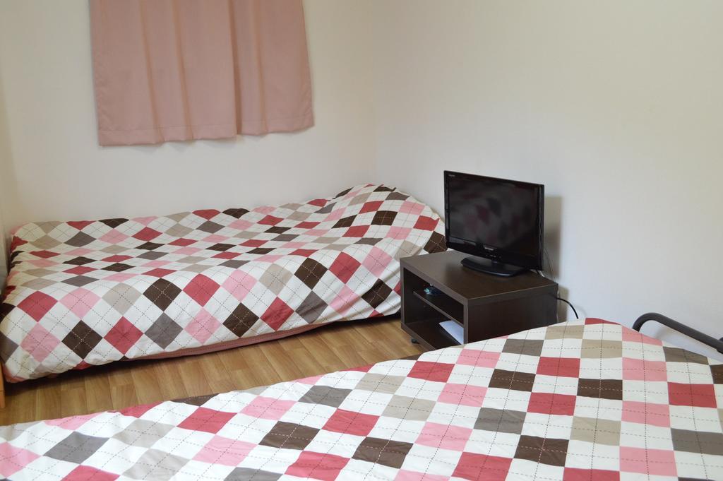 Guest House Fukutomi - Female Only Naha Zimmer foto